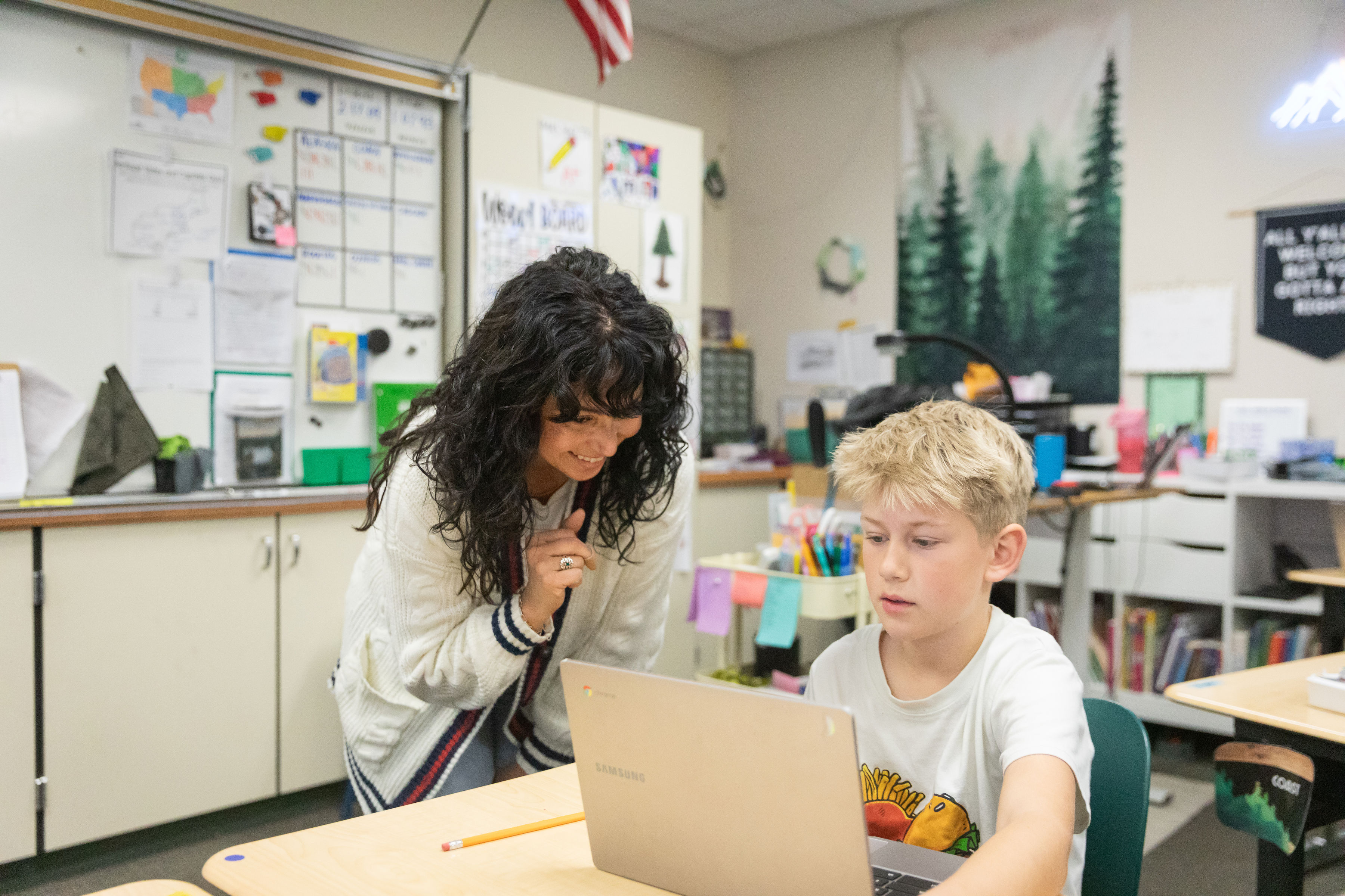 Ruhkala Elementary teacher working with student in class.